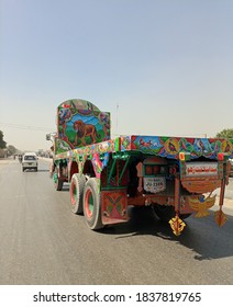 An Empty Flatbed Truck Moving On Road - Karachi Pakistan - Oct 2020