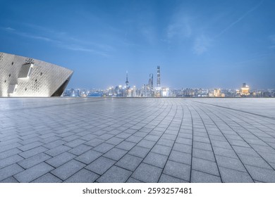 Suelo vacío y paisaje urbano con arquitectura de edificios modernos por la noche en Shanghai