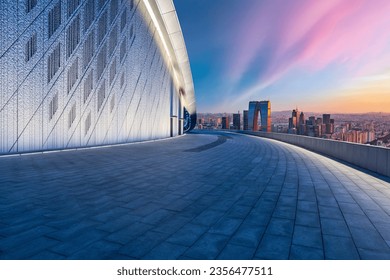 Empty floor and modern city skyline with building at sunset in Suzhou, Jiangsu Province, China. high angle view. - Shutterstock ID 2356477511