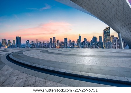 Empty floor and modern city skyline with building at sunset in Shanghai, China. 