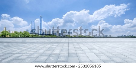 Empty floor square and cityscape with skyline in modern city