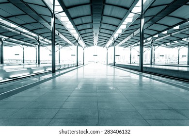 Empty floor of train station platform