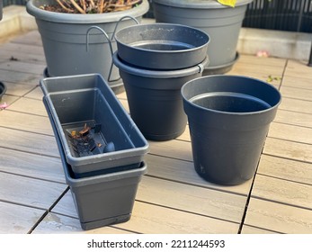 Empty flower pots in balcony garden, gardening equipment