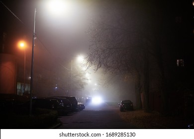 Empty Foggy Moody City Street During Night