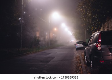 Empty Foggy Moody City Street During Night