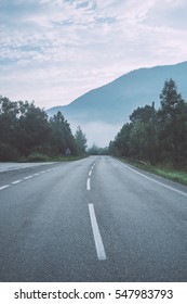 Empty Foggy Road