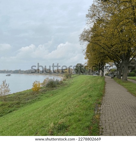 An Empty footpath along Rhine river in Benrath Düsseldorf - Winter time  Stock photo © 