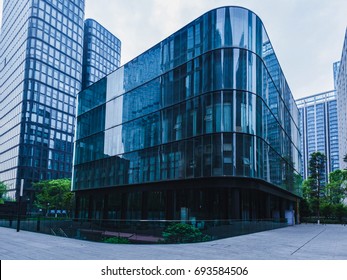 Empty Footpath In Front Of Modern Office Building Exterior