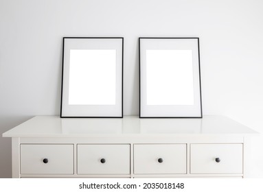 Empty frames for mock up, with white passepartout, standing portait mode.