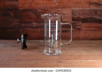 Empty French Press In Rustic Kitchen