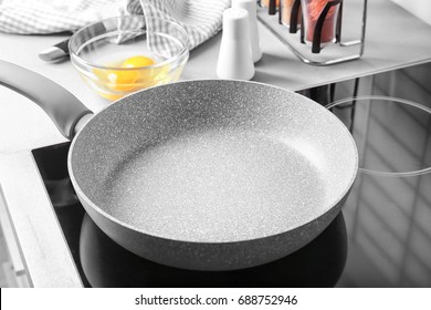 Empty Frying Pan On Kitchen Stove