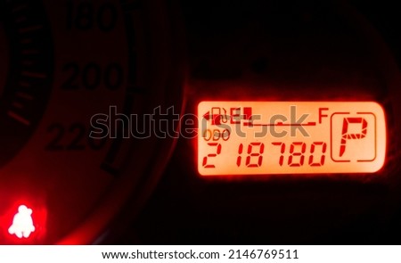 Empty fuel warning light in car dashboard