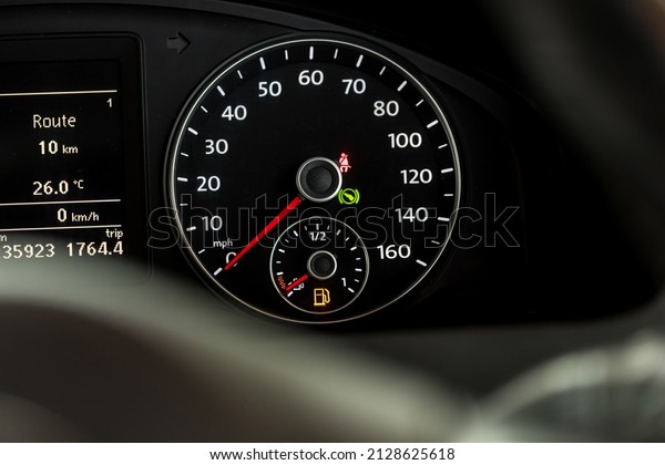 Empty fuel warning light in car dashboard.\
Fuel pump icon. gasoline gauge dash board in car with digital\
warning sign of run out of fuel turn on. Low level of fuel show on\
speedometer dashboard.