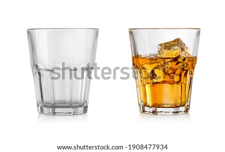 Empty and full whiskey glass isolated on white background with clipping path
