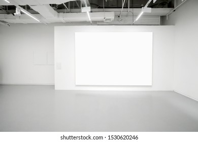 Empty Gallery Interior Space, White Walls And Grey Floors