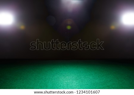 Empty gambling table in green colors. Light effect.