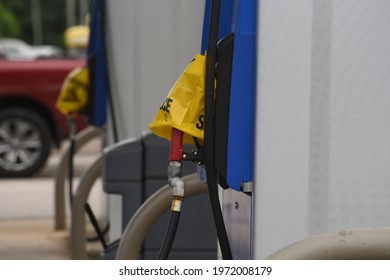 Empty Gas Pumps At A Service Station Are Covered With Yellow Bags After A Cyber Attack Disrupted Distribution To The Southeast US. 