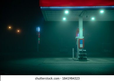 Empty Gas Station During a Foggy Night