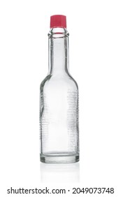 Empty Glass Bottle From Hot Sauce On White Background