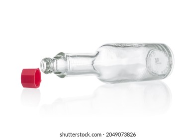 Empty Glass Bottle From Hot Sauce On White Background