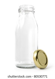 Empty Glass Bottle Of Milk With Golden Cap Isolated On White Background