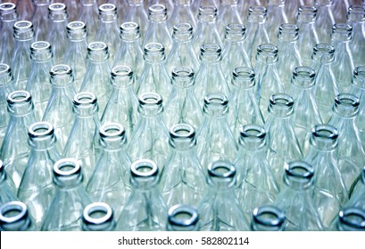 Empty glass bottles in factory to fill with drink