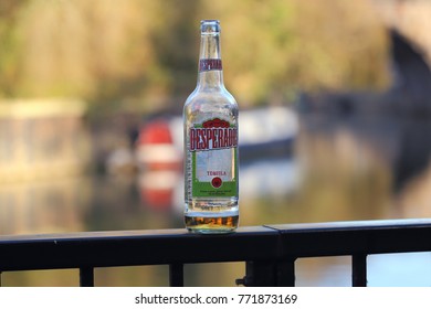 Empty glass of Desperados Tequila beer left on the street.Bath,England,01/12/2017.The Tequila Regulatory Council says Desperados is flouting rules on protected designation of origin.