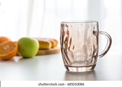 Empty Glass With Fruit Near Window On The Table