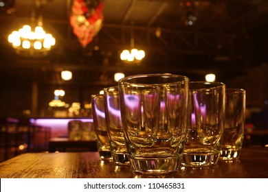 Empty Glass On Table In Night Club