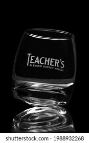 An Empty Glass With A Round Bottom, From Under Teacher's Blended Scotch Whisky On A Black Background. Russia, Ulyanovsk Region, Dimitrovgrad December 1, 2015