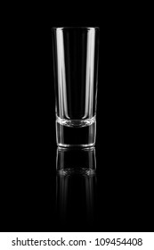 Empty Glass Of Vodka On Black Background