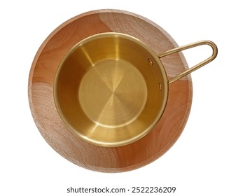 Empty golden bowl with handle on wooden tray isolated on white background with clipping path. Top view, flat lay. Mockup template for food poster design.