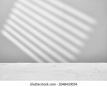 Empty gray background with lights and shadows