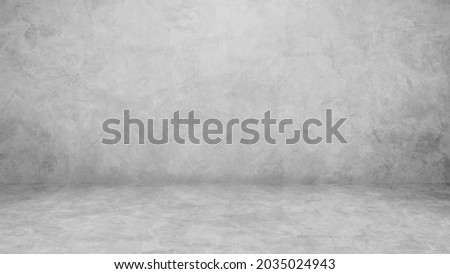 Empty gray cement wall room interior Studio Background and Floor perspective with soft light well display product and text present on free space concrete Backdrop 