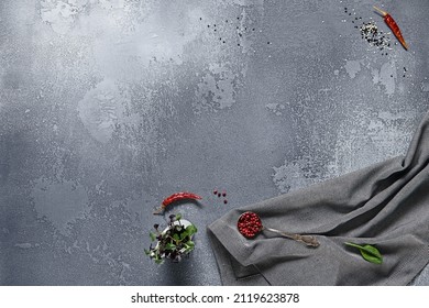 Empty gray stone background with textile and ingredients. Food background in rustic style. Cement table with kitchen towel and spices. Aesthetic minimal background - Shutterstock ID 2119623878