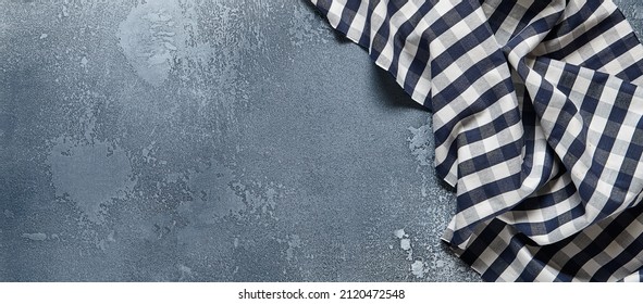 Empty gray stone background with textile and ingredients. Food background in rustic style. Cement table with kitchen towel and spices. Aesthetic minimal background - Shutterstock ID 2120472548