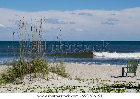 Similar – Image, Stock Photo a solitary chair in a chilling place