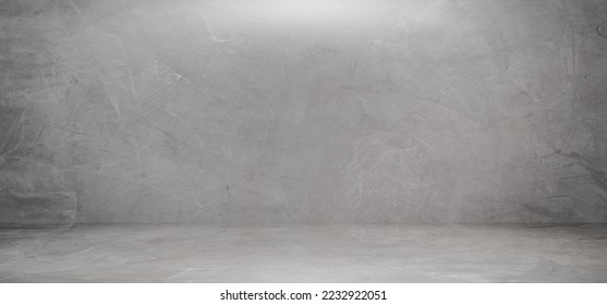 Empty grey wall room Material Studio Background with soft light and Cement rough Floor well editing display products and text present on free space Concrete Backdrop - Shutterstock ID 2232922051