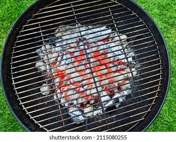 Empty Grill Grate Over Hot Pieces Of Coals. Top View.