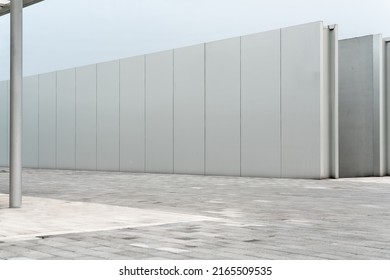 empty ground floor in front of modern architecture exterior. - Shutterstock ID 2165509535