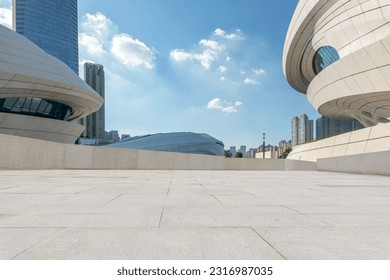 empty ground floor with modern cityscape and office buildings. - Powered by Shutterstock