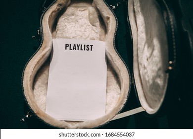 Empty Guitar Case With A Playlist Blank Paper