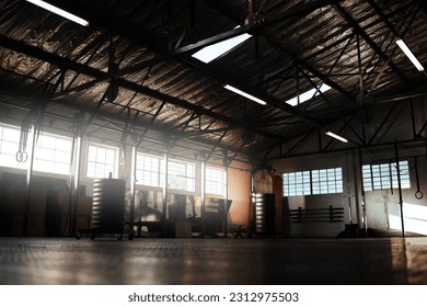 Empty gym, fitness or floor space for training hall in open room or health studio for exercise or workout. Interior, background or clean facility building for athletic sports or athletics development