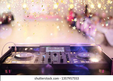 Empty hall during party or wedding celebration with dj mixer and space for text