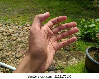 empty hand on stone background 