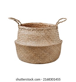 Empty handwoven seagrass belly basket with handles for storage laundry and toys or can use as cachepot. Trendy design. Round storage basket in braided seagrass, isolated on white background with