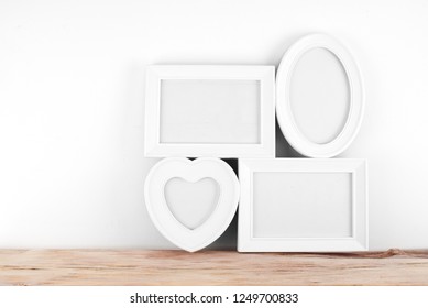 Empty, Heart Shaped Photo Frame On White Background