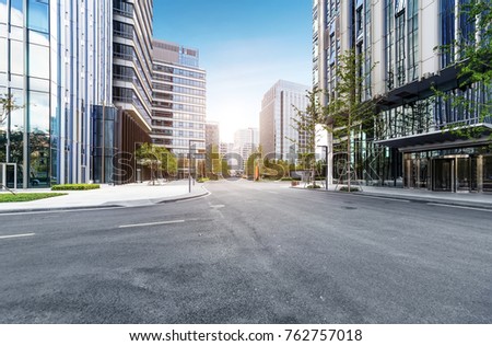 empty highway with cityscape and skyline of qingdao,China.