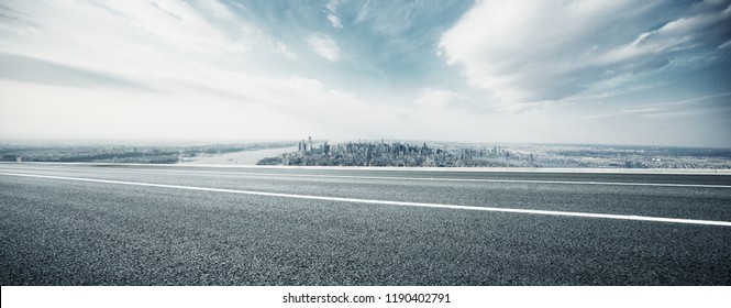 Empty Highway Through Modern City