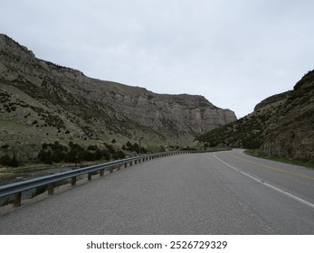 An empty highway through the valley